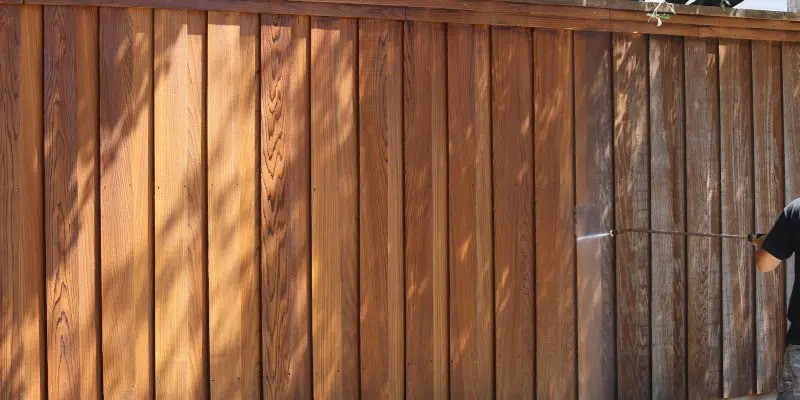 Solid Stain Over a Painted Fence